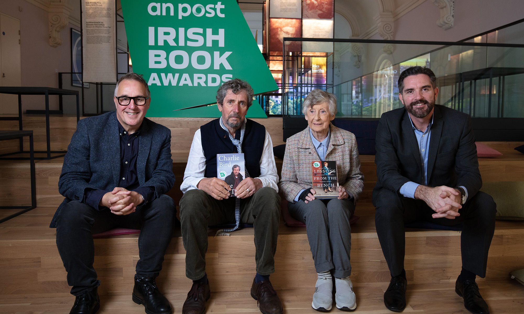 An Post CEO, David McRedmond and An Post Irish Book Awards Chairperson, Brendan Corbett sit with shortlisted authors Charlie Bird and Judge Gillian Hussey at the Museum of Literature Ireland.